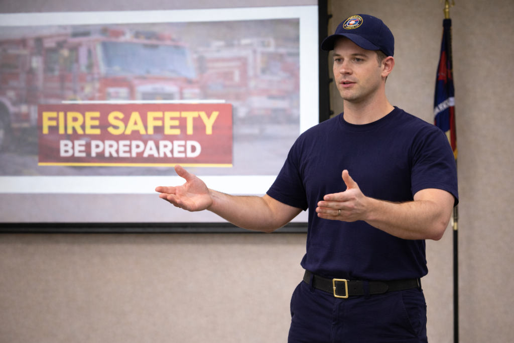 firefighter discussing fire safety awareness